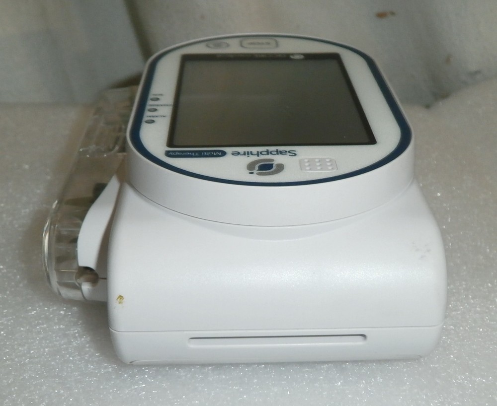 QCORE Sapphire multi therapy pump with accessories (has bad battery)