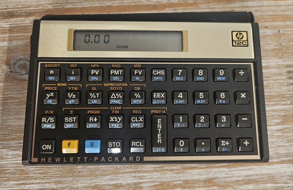 Working Hewlett Packard HP 12C Calculator With Protective Sleeve Case