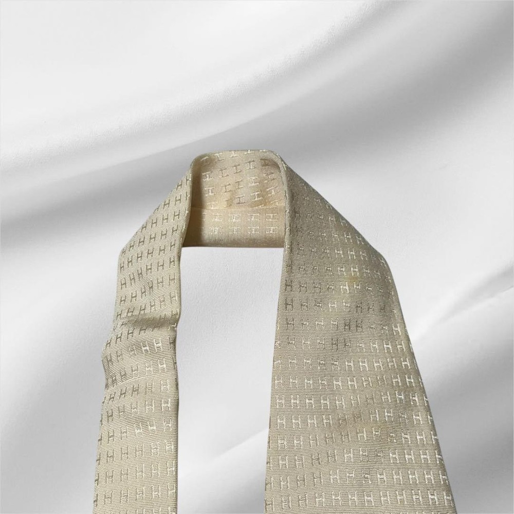 Excellent condition HERMES Tie H Pattern Fasone Solid Ivory White