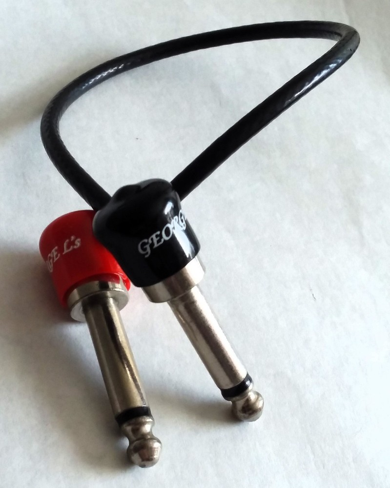 George L's 9" Patch cable Right ends with covers.