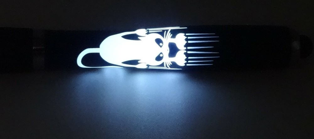 Lighted cat scratching ink pen