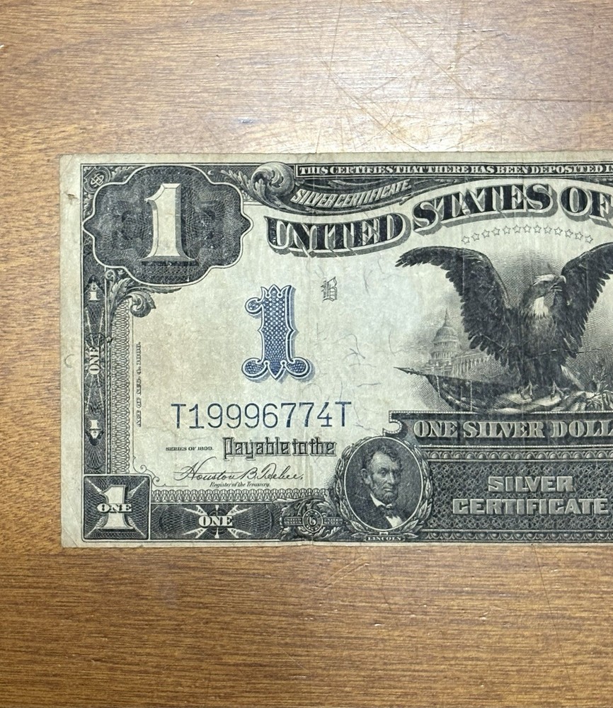 1899 $1 Large Size Black Eagle ( Triple 9’s)