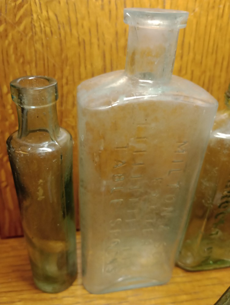 SIX antique bottles