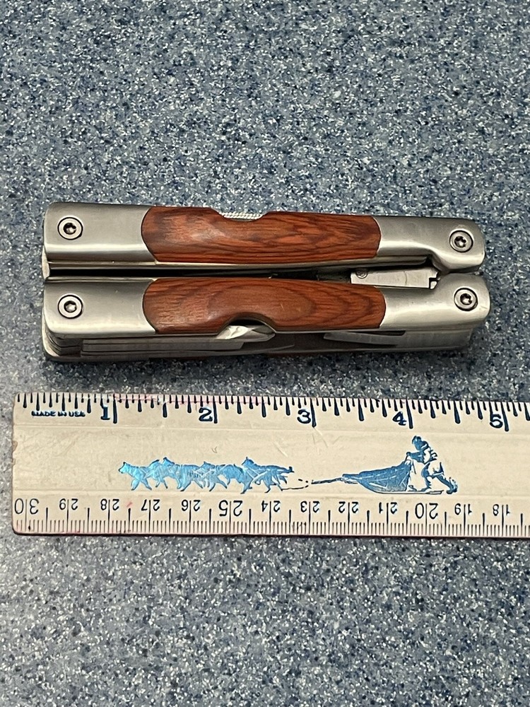 Elk Ridge-Multi Tool With Assorted Tools -pliers -knife-sockets- Bottle Opener