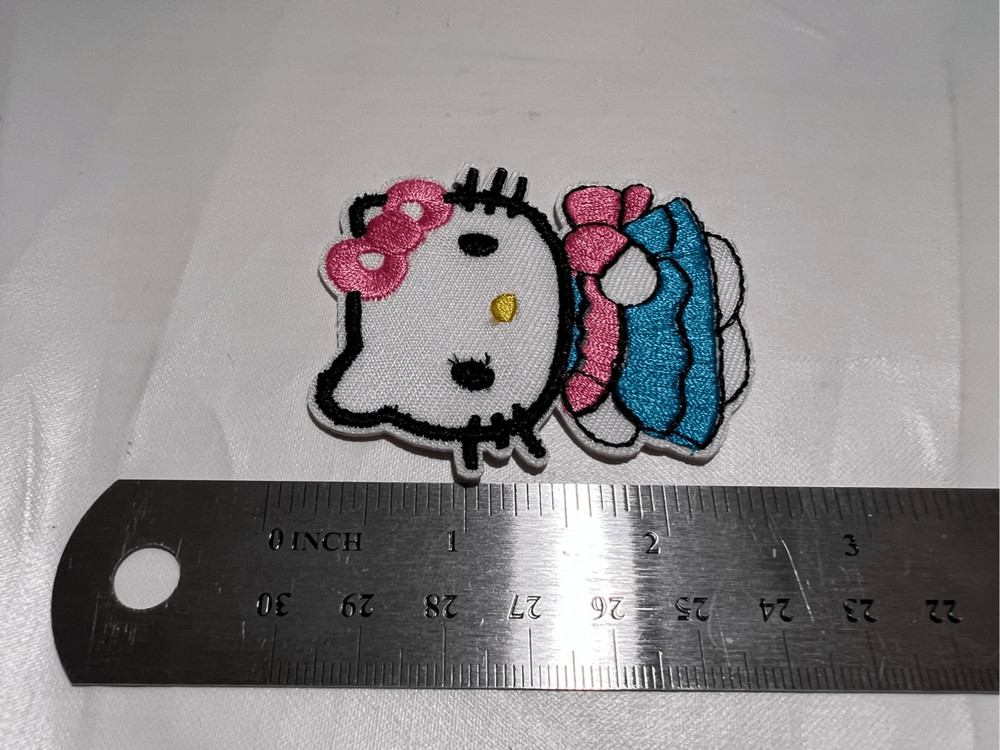 Hello Kitty with a Dress On Iron on Patch