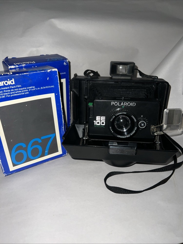 Polaroid EE100 Folding Instant Film Camera; 2 Boxes B&W Film; Untested