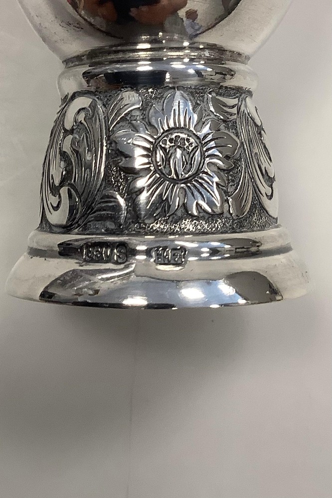 Egg cup in silver with ornamentation