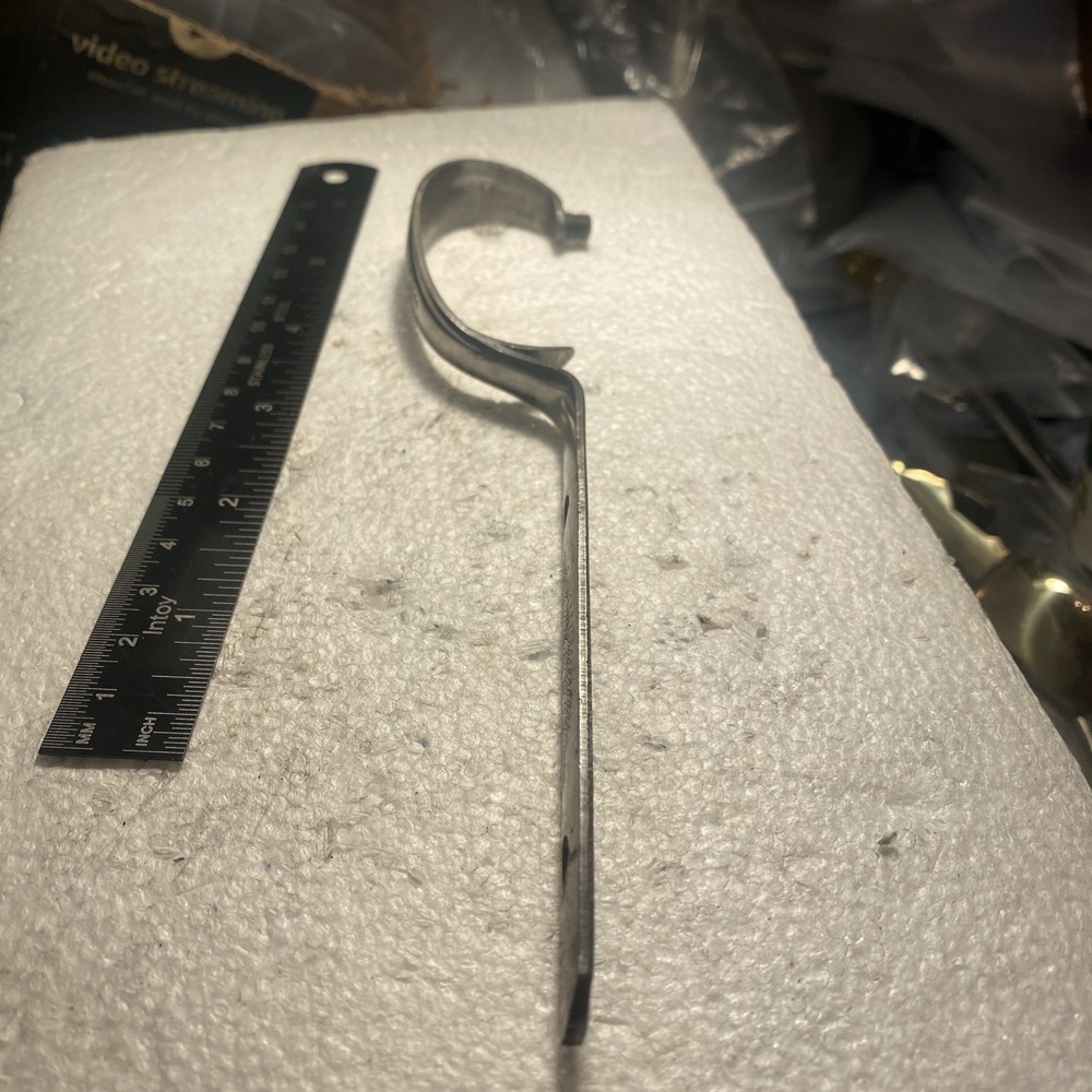 Silver Trigger Guard Of Unknown Brand.