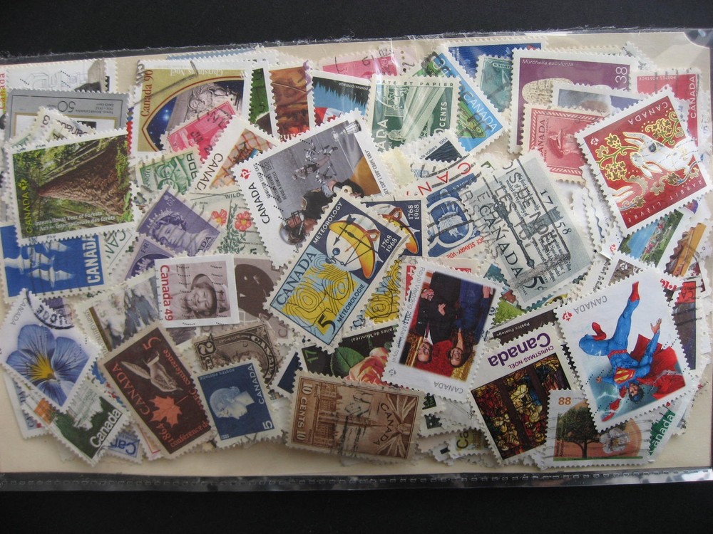 Canada colossal mixture (duplicates, mixed cond) 10000 35% comems, 65% defins