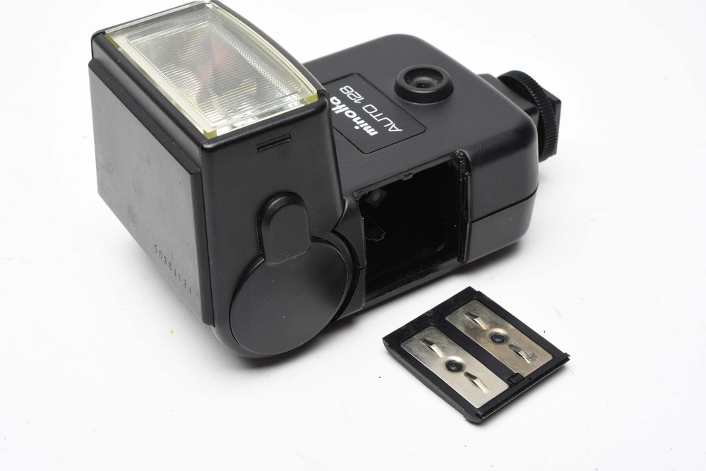 Minolta Auto 128 electronic flash, nice & clean, tested, w/Case+Manual