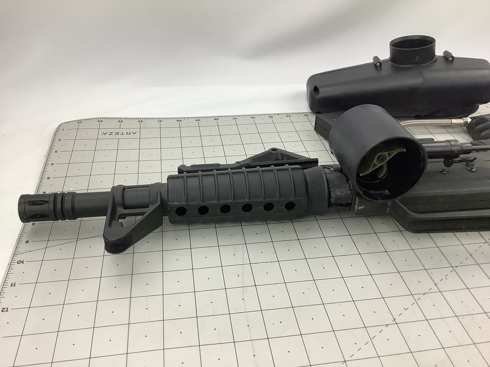 Tippmann Alpha black paintball marker with e trigger and cyclone feed untested