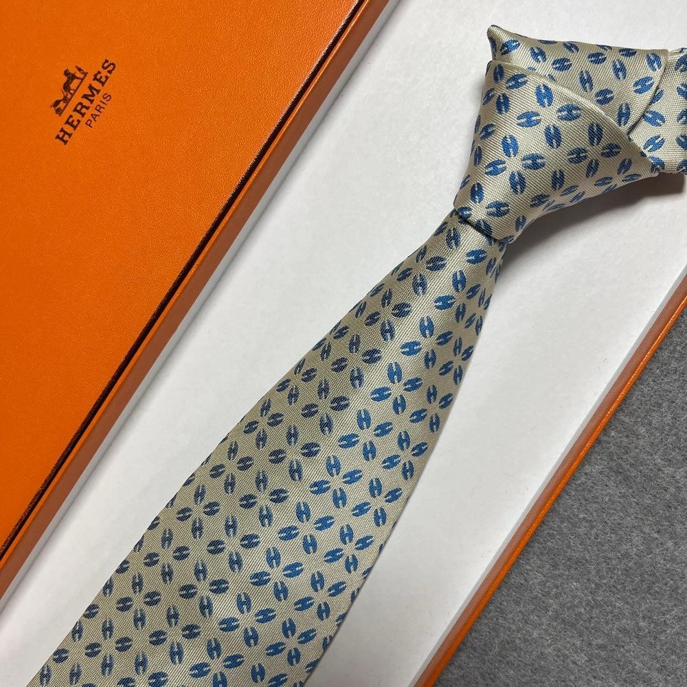 HERMES tie blue and white H pattern silk jacquard