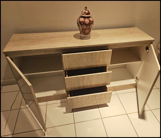 Spacious sideboard with three sliding drawers, two shelved cabinet compartments
