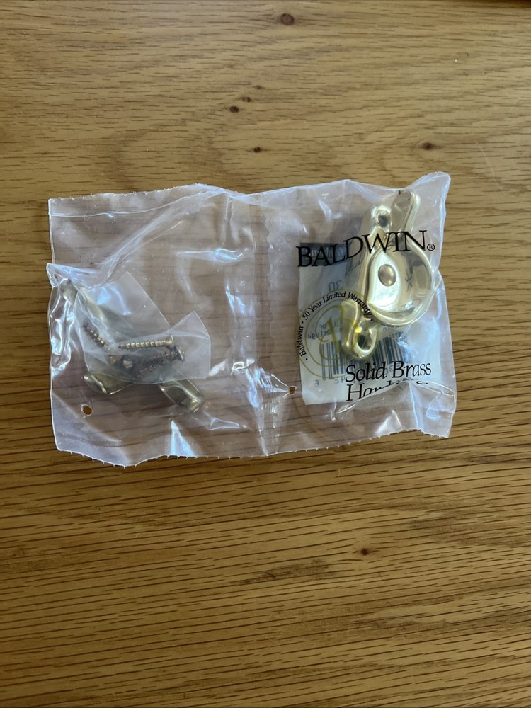 Baldwin 0452 Solid Brass Traditional Style Sash Lock - Brass