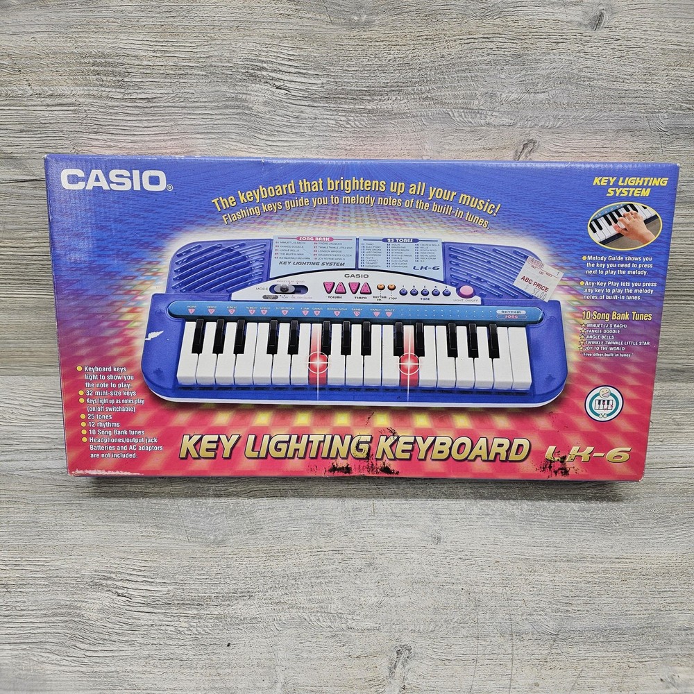 Casio LK-6 Key Lighting 32-Key Blue Learning Electronic Keyboard Battery Powered
