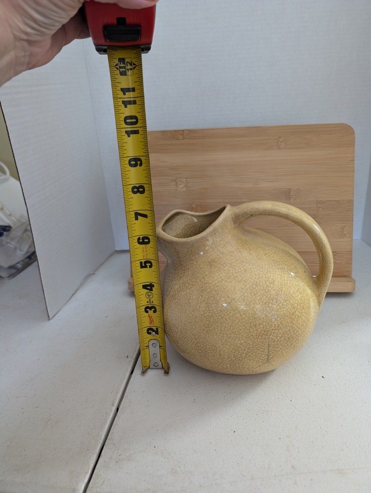 Vintage Yellow Tilted Ball Pitcher