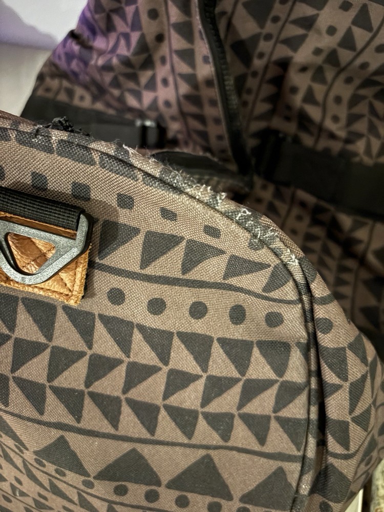 Hershel Supply Co. Novel Duffle / Geometric Triangle Pattern / Brown-Black