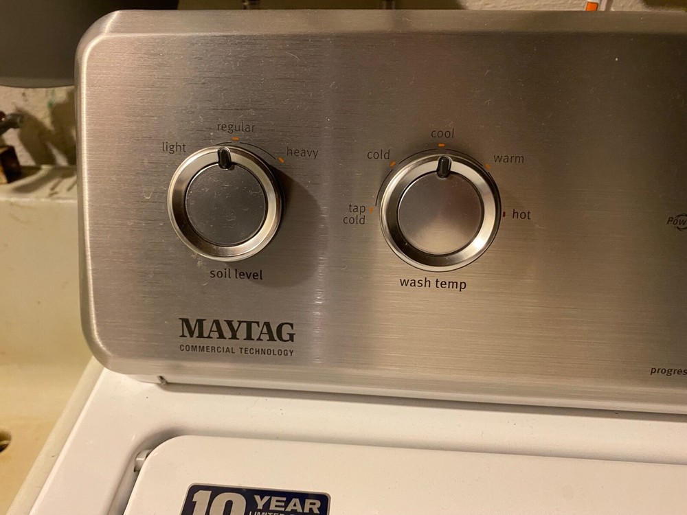 Lightly used white Maytag top load washing machine/ front load dryer