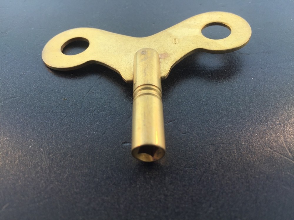 Solid Brass Wide Wing Clock Key. # 8 or 4 mm. or .165 inches