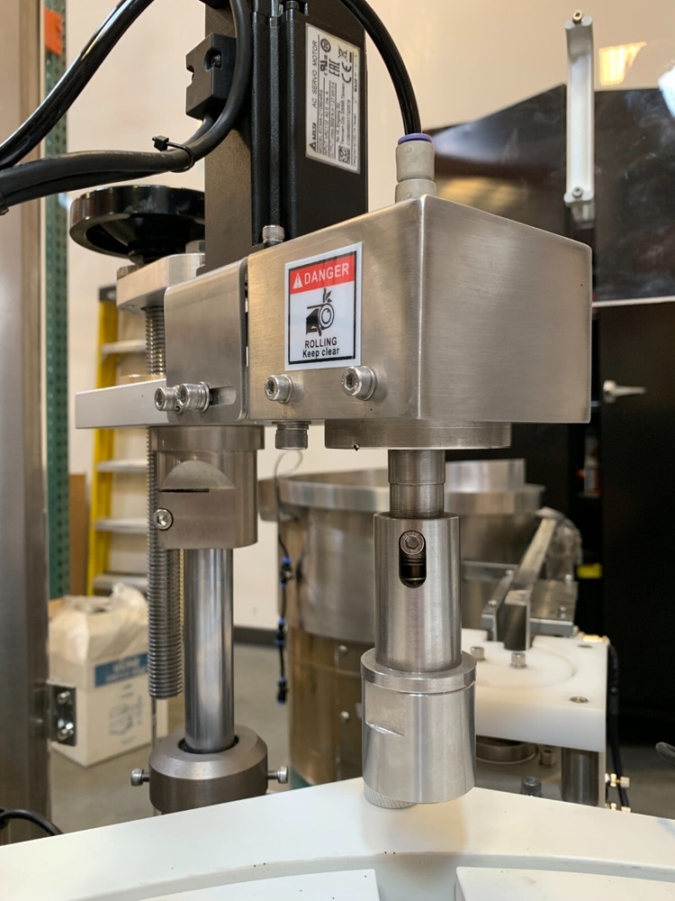 Automated Filling and Capping machine