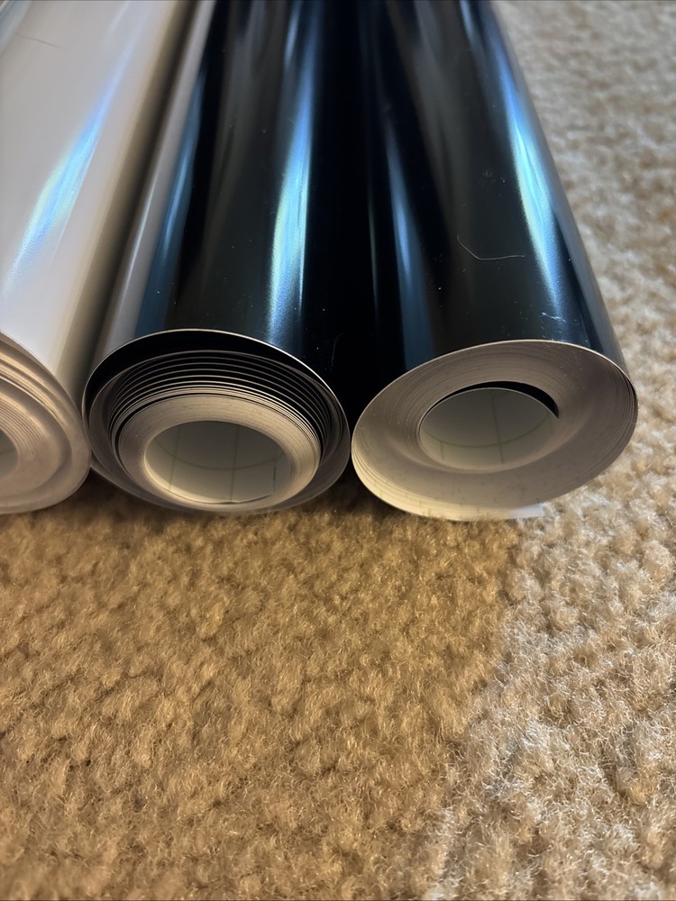 Cricut vinyl rolls- 2 White & 2 Black