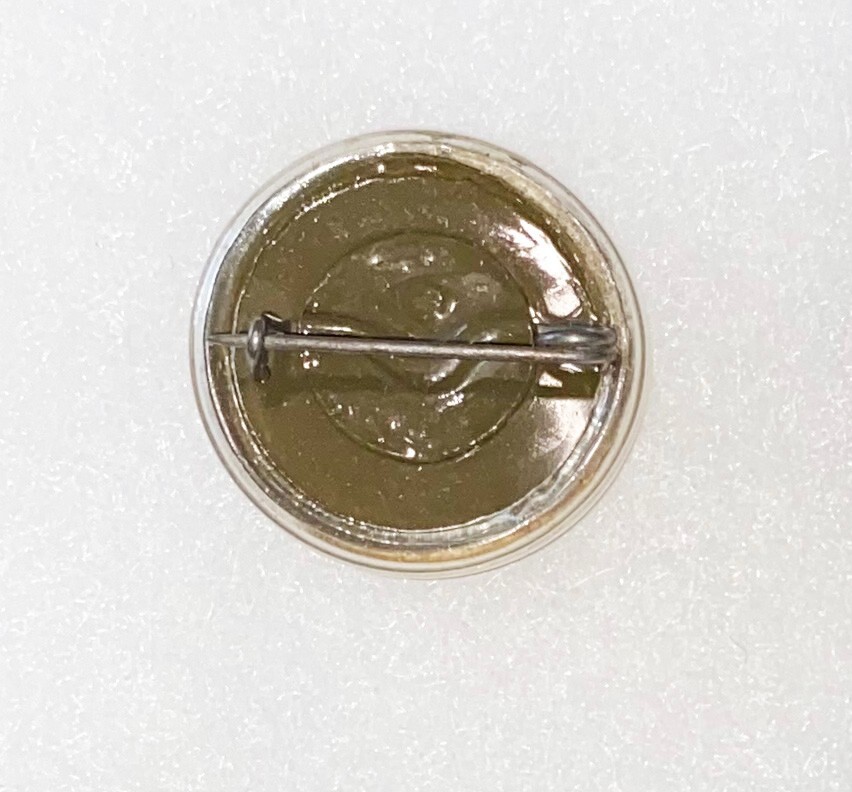 New York Plastic Pin Back Collar Disc.