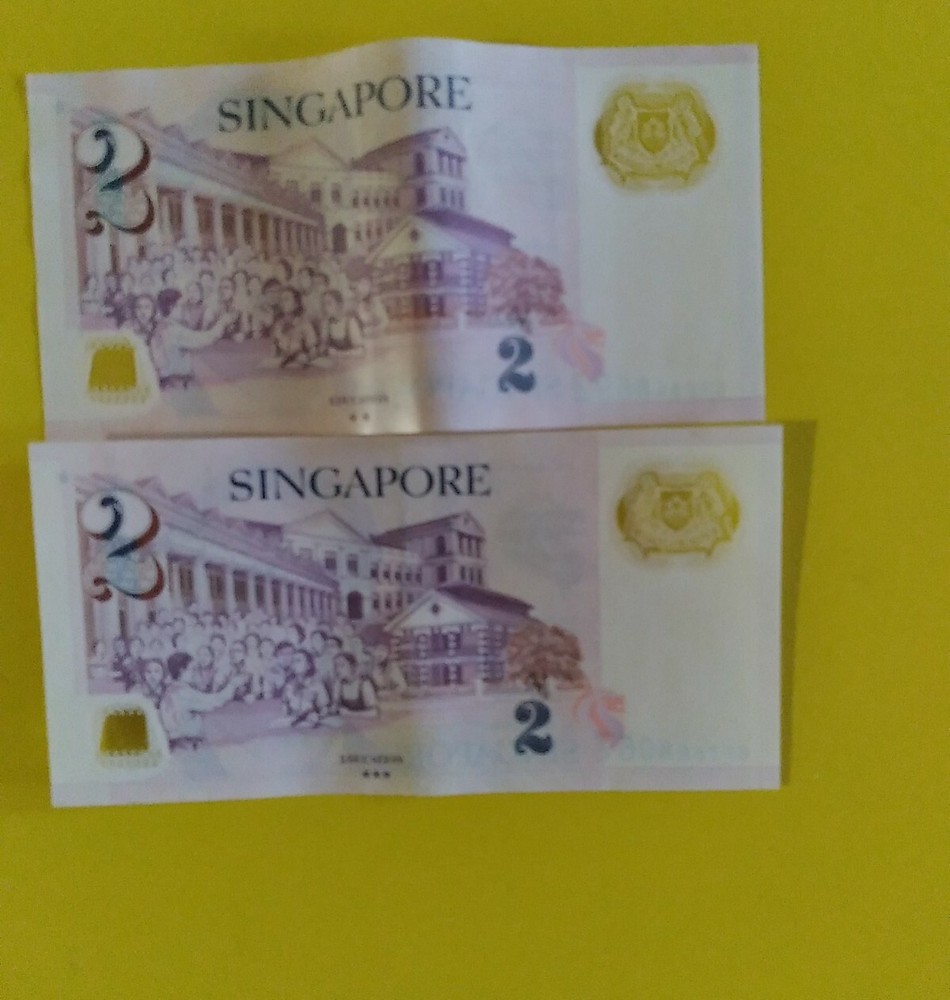 1987 SINGAPORE: $2.00 BANKNOTE EDUCATION THEME 2 CONSECUTIVE UNCIRCULATED