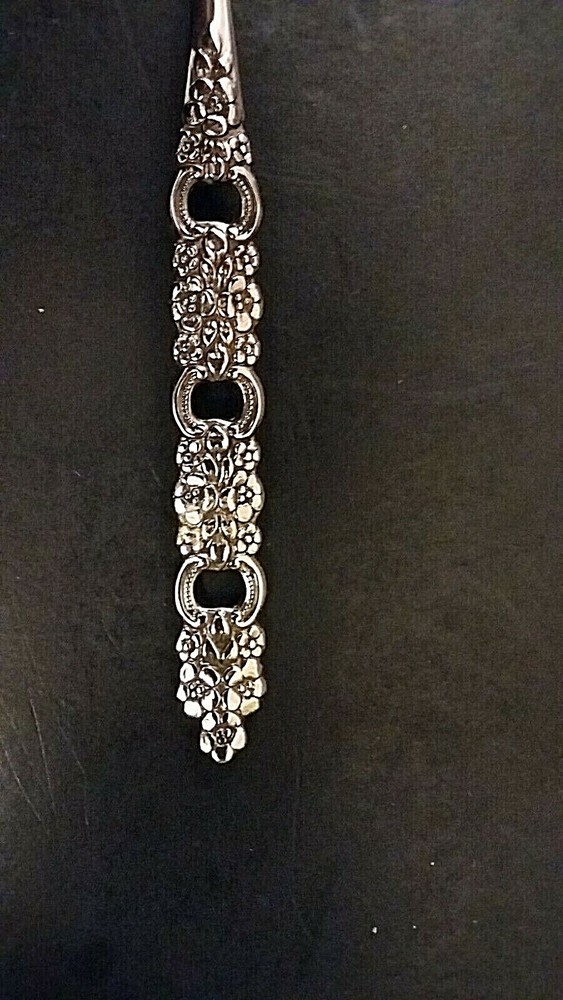 Oneida Viola stainless sugar spoon 6"