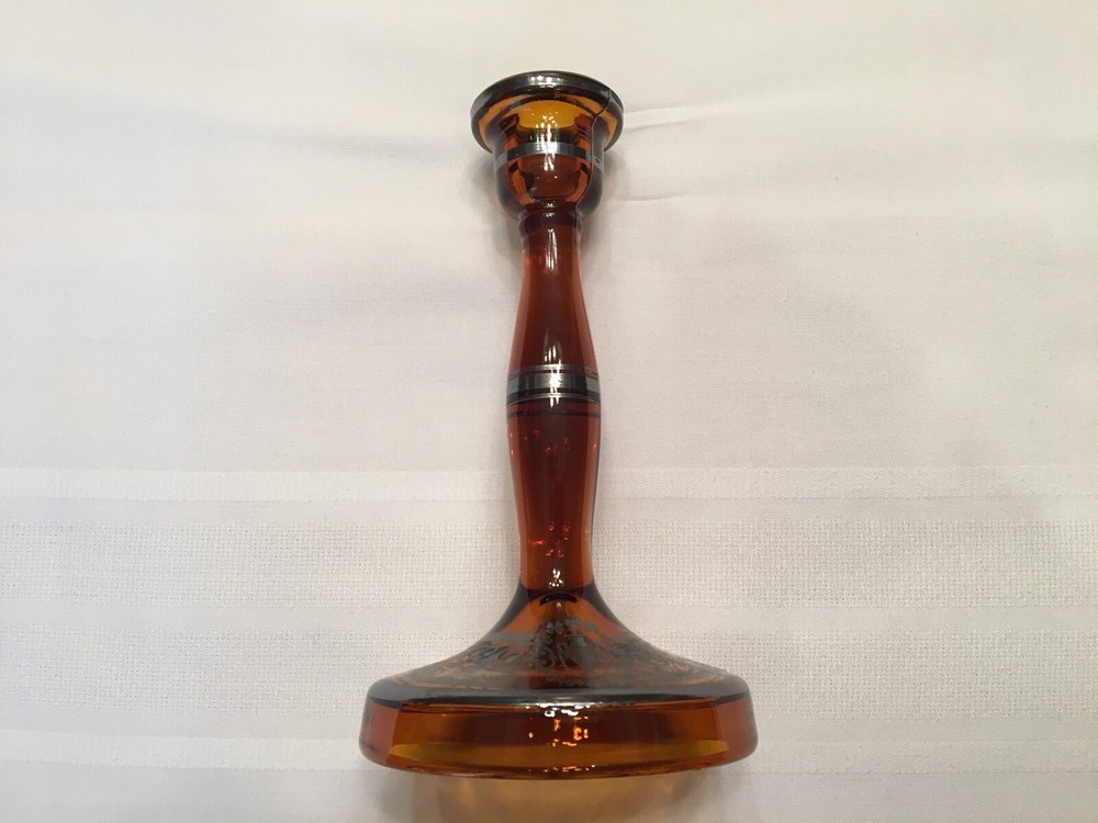 Antique amber candle stick with sterling silver applica