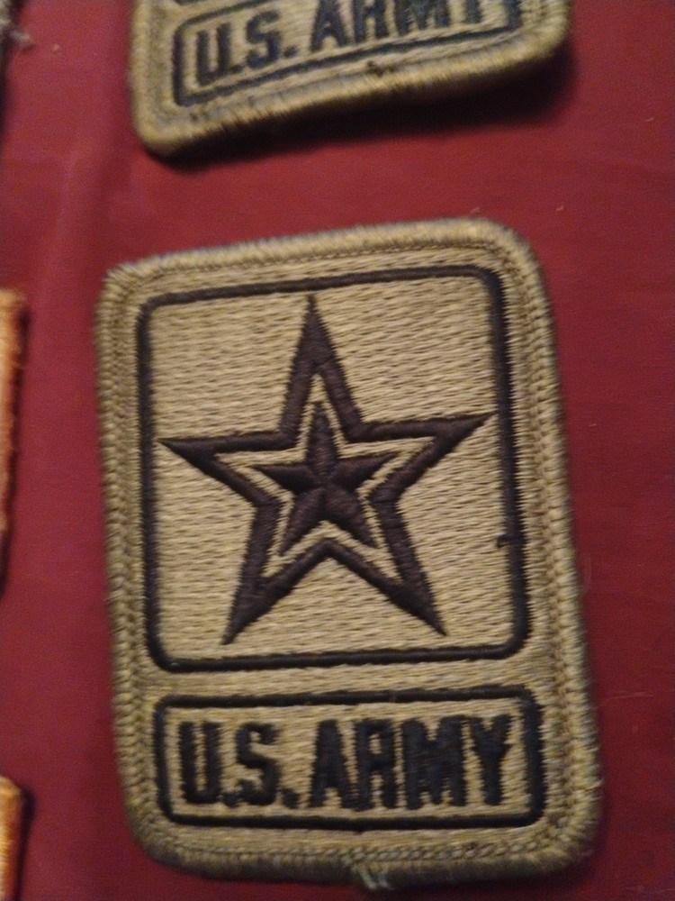 Army Patches And A Hat