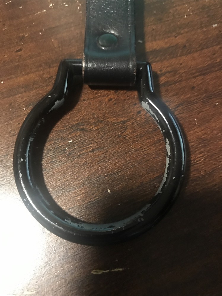 Flashlight holder for belts