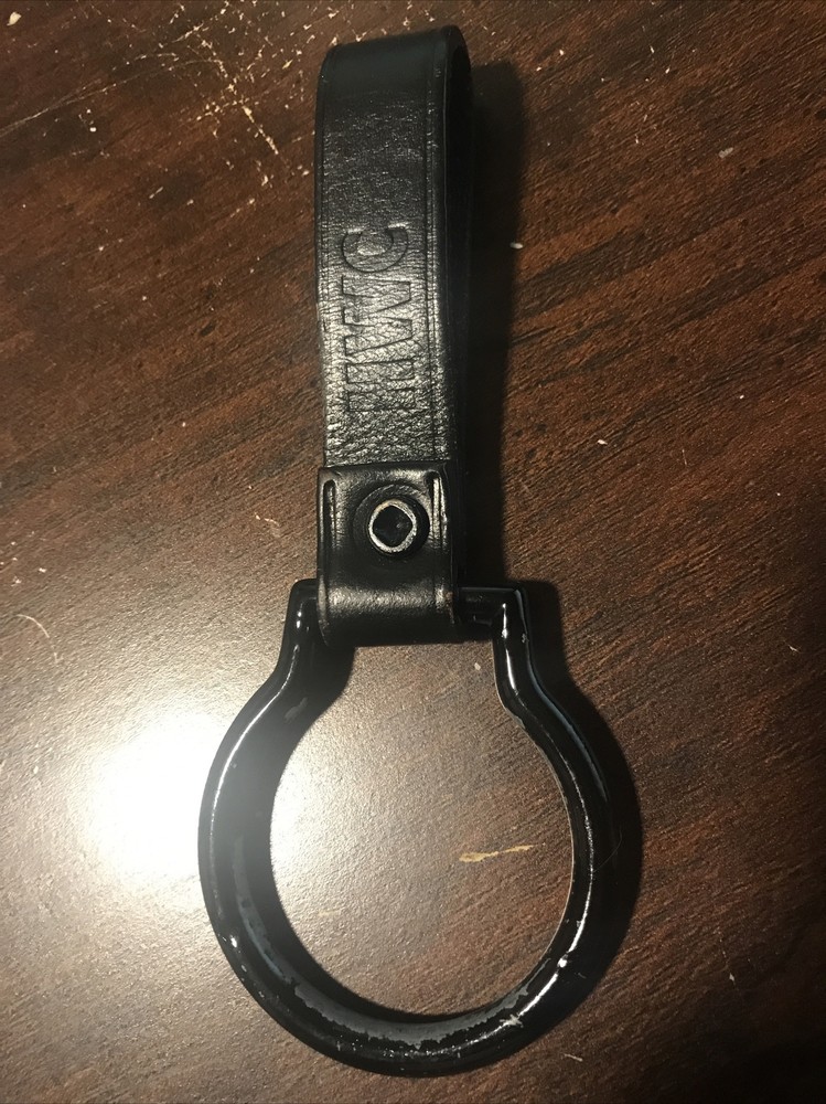 Flashlight holder for belts