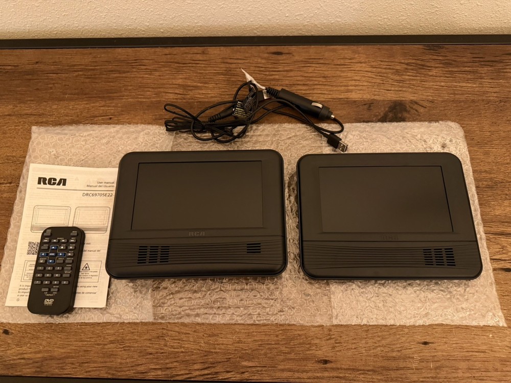 Duel Screen 7" Mobile DVD System RCA NEW No Mounting Straps A11