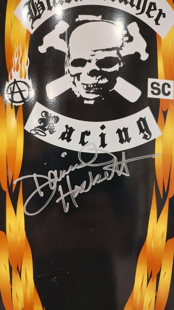 David Hackett Black leather racing signed skateboard