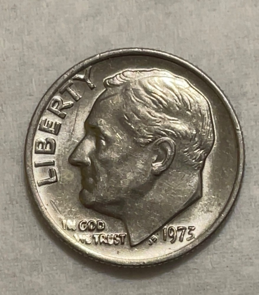 1973 no mint mark dime with DDO error