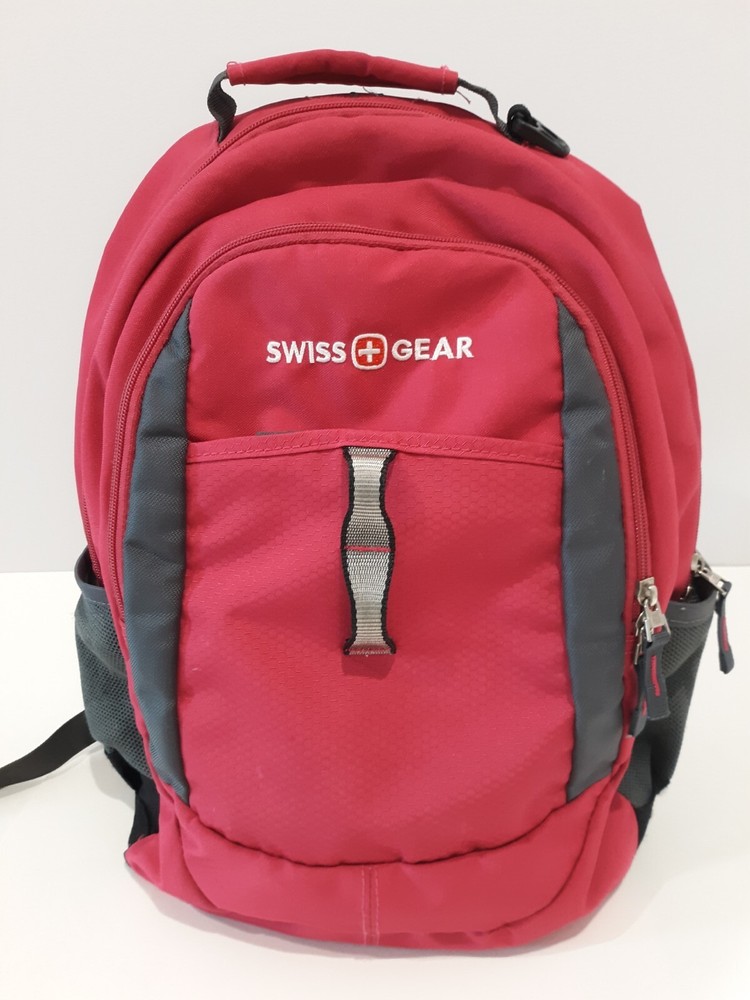 Red backpack made in Switzerland
