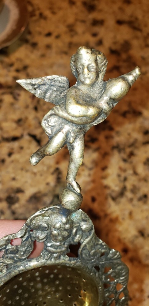 Ornate Antique Tea Strainer - Etched - Unknown Origin - see pics Cherub handle