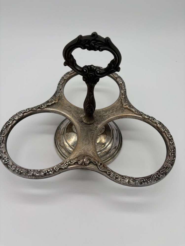 Vintage Sheridan silver-plated condiment caddy with ornate scrollwork