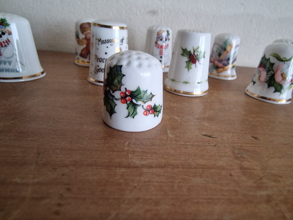 9 x Christmas themed thimbles