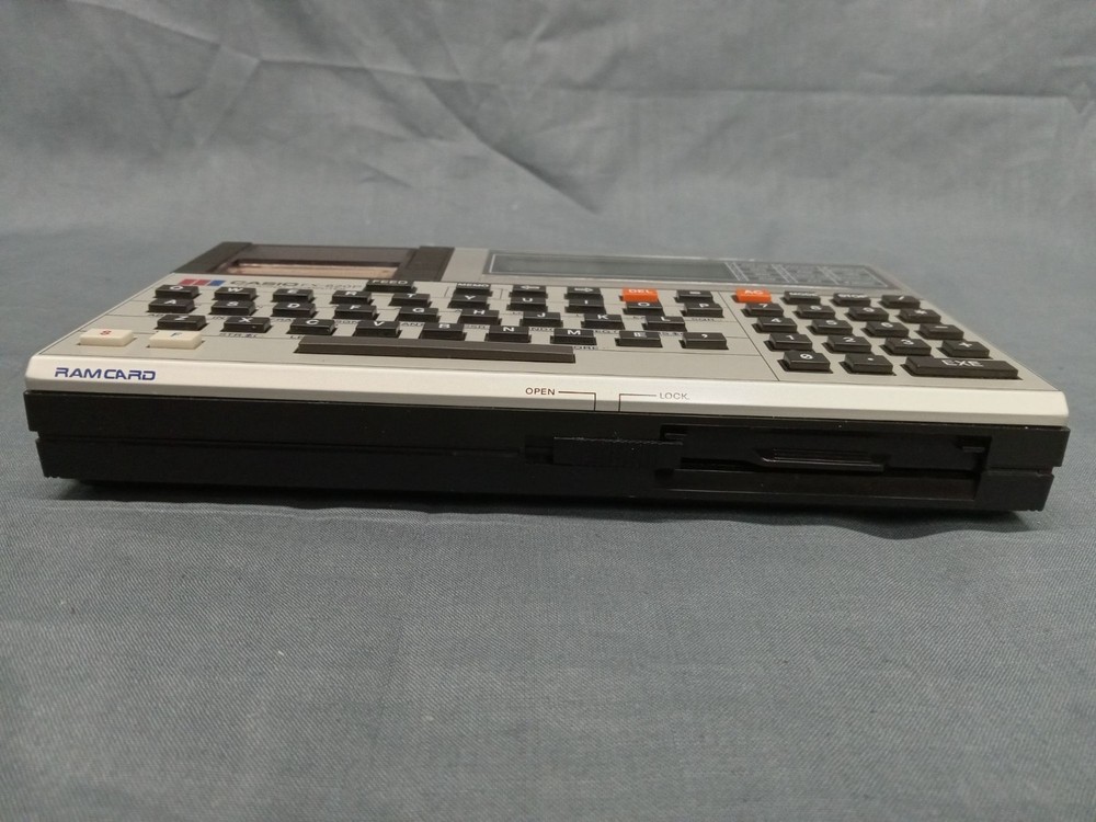 CASIO FX-820P Personal Computer With Charger Case and Manuals FULLY FUNCTIONAL!