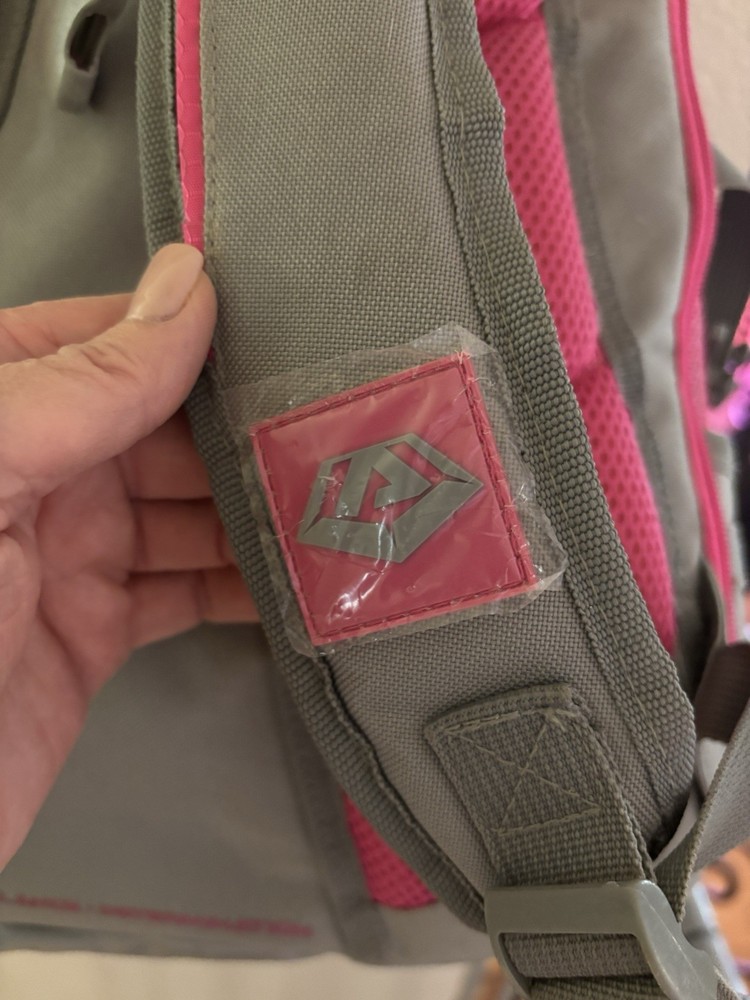 Large softball backpack 2 bats Backpack bag. Excellent Condition. Grey-pink.