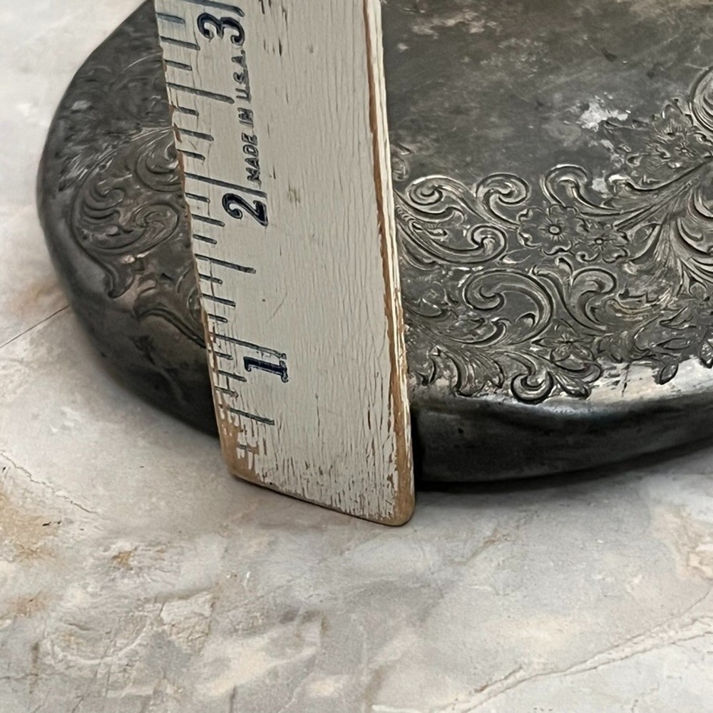 Silver Plated Hand Held Mirror with Intricate Raised Floral Scrollwork
