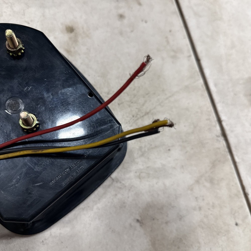 Combination stop/turn/tail/back-up light, hard wired, passenger side