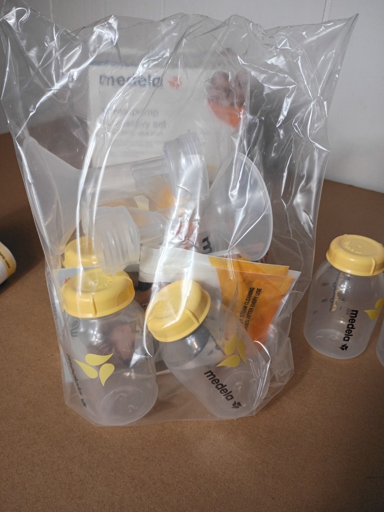 Medela Breastpump Accessory Set Open Box New with Extra Bottles and Cleaning Bag