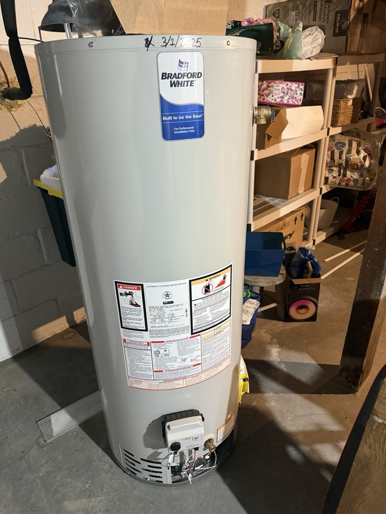 water heater !!! 700 or better offer! Never been used brand new ! 50 gallon