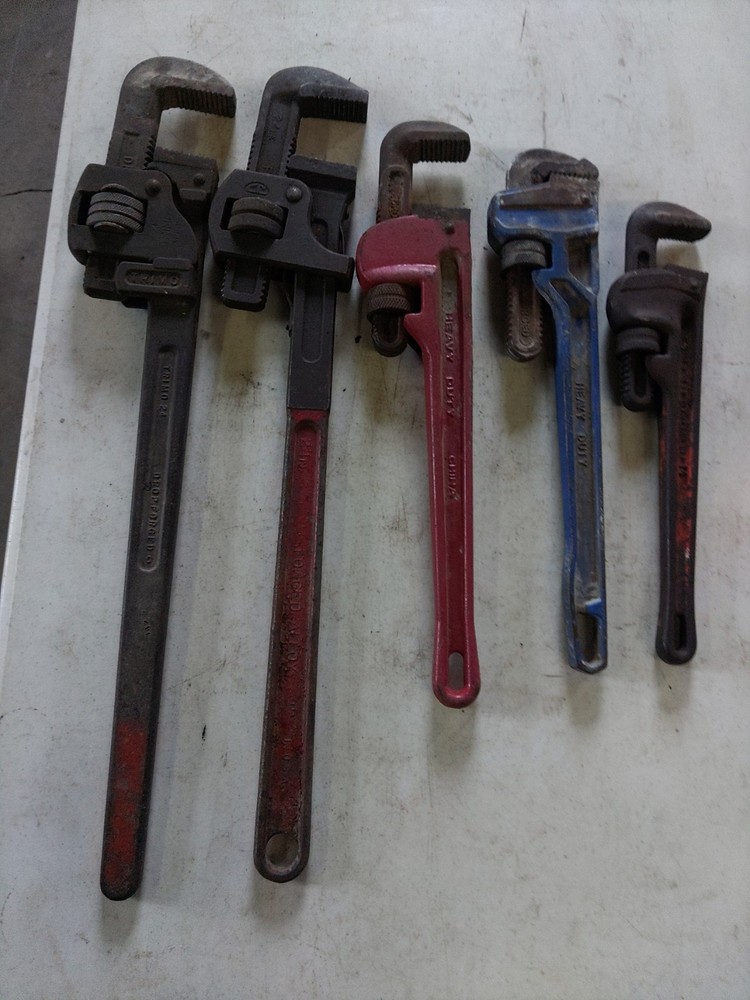 assorted pipe wrenchs