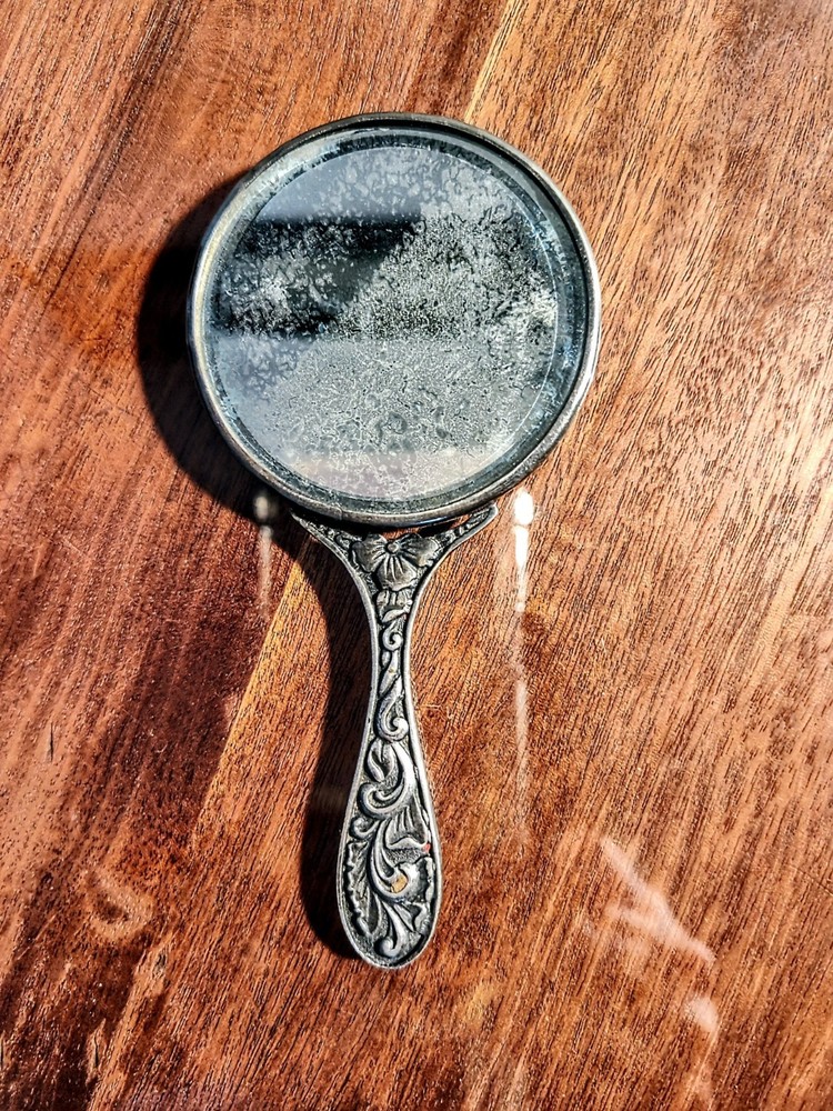 Vintage Silver TonThis is ae Compact Hand Held Mirror with hallmarks on it