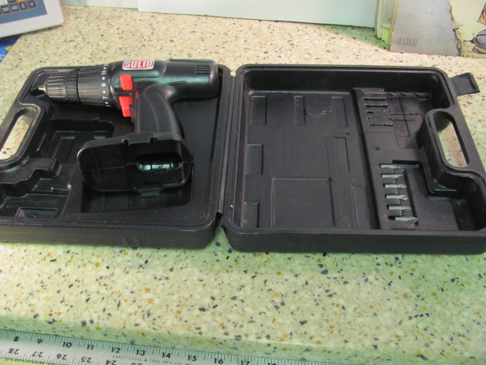SOLID BRAND DRILL - NO BATTERY - W/ CASE AND BITS