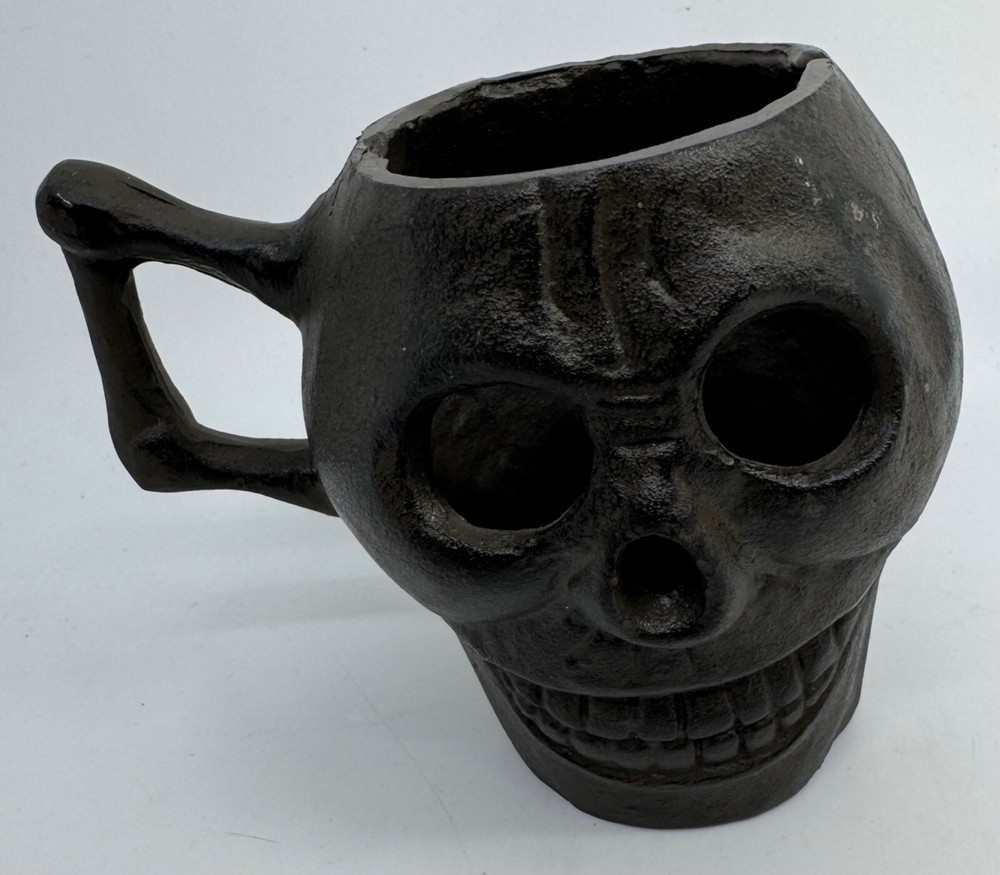 Cast Iron Skull-Shaped Bottomless Mug Thingy With Handle Both Ends And Eyes Open