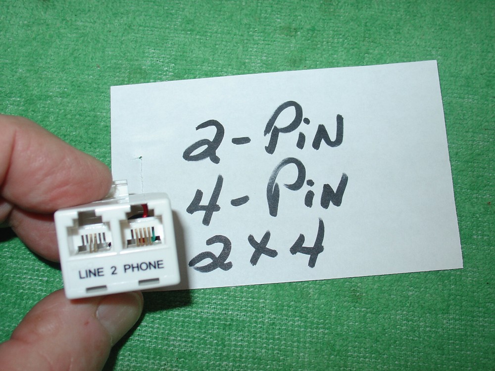 AT&T = DSL PHONE ADAPTER COUPLING ADAPTER 2PIN + 4 PIN